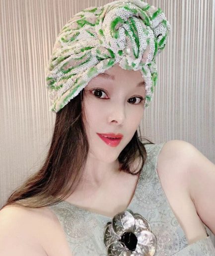 White sequined knotted headscarf a fresh and stylish look